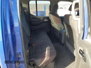 2012 Nissan Frontier Pro-4X z VIN 1N6AD0EV4CC436556, wystawiony jako Copart lot #83876764 z przebiegiem 111 224 mil mil oraz Szkoda całkowita • Salvage title. Historia ofert i sprzedaży dostępna na DreamBid. Obrazek 10.