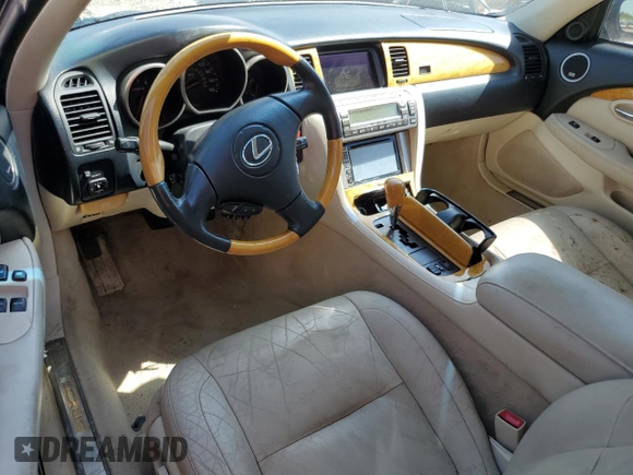 2003 Lexus SC 430 z VIN JTHFN48Y930048533, wystawiony jako Copart lot #57091815 z przebiegiem Nie podano mil oraz Szkoda całkowita • Salvage title. Historia ofert i sprzedaży dostępna na DreamBid. Obrazek 8.