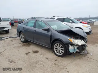 2014 Toyota Camry Hybrid LE with VIN 4T1BD1FK6EU112308, listed as a IAAI auction lot 41175963 with 116,557 mi miles. Bid and sale history available at carsss.com. Image 1.