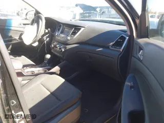 2016 Hyundai Tucson SE with VIN KM8J3CA41GU133962, listed as a IAAI auction lot 41634282 with 101,705 mi miles. Bid and sale history available at carsss.com. Image 5.