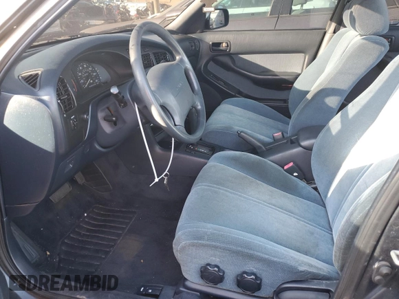 1992 Toyota Camry LE z VIN JT2SK12E6N0006628, wystawiony jako Copart lot #43110275 z przebiegiem 65 591 mil mil oraz Nie do naprawy • Non repairable. Historia ofert i sprzedaży dostępna na DreamBid. Obrazek 7.
