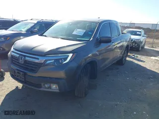 2020 Honda Ridgeline RTL-E with VIN 5FPYK3F72LB011694, listed as a IAAI auction lot 41628184 with 76,011 mi miles. Bid and sale history available at carsss.com. Image 17.