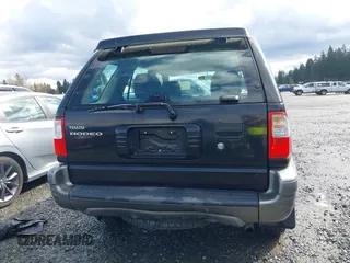2001 Isuzu Rodeo z VIN 42CK58W9143610580, wystawiony jako IAAI lot #41939199 z przebiegiem 125 754 mil mil oraz . Historia ofert i sprzedaży dostępna na DreamBid. Obrazek 16.