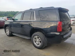 2019 Chevrolet Tahoe LT with VIN 1GNSKBKC2KR349527, listed as a Copart auction lot 58496695 with 128,590 mi miles and Salvage title. Bid and sale history available at DreamBid. Image 2.