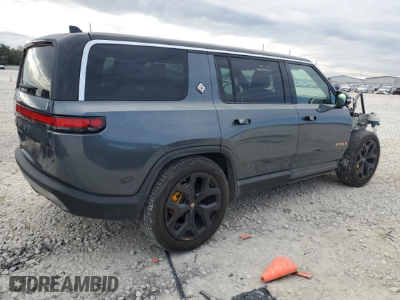 2022 Rivian R1S Launch Edition with VIN 7PDSGABL3NN000739, listed as a Copart auction lot 88127995 with 12,143 mi miles and Salvage Title. Bid and sale history available at DreamBid. Image 3.
