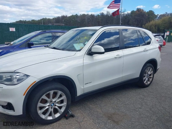 2016 BMW X5 xDrive35i with VIN 5UXKR0C59G0S93024, listed as a IAAI auction lot 42059465 with 121,334 mi miles. Bid and sale history available at carsss.com. Image 15.