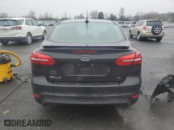 2015 Ford Focus SE with VIN 1FADP3F24FL251916, listed as a Copart auction lot 52800145 with 131,862 mi miles and Salvage Title. Bid and sale history available at DreamBid. Image 6.