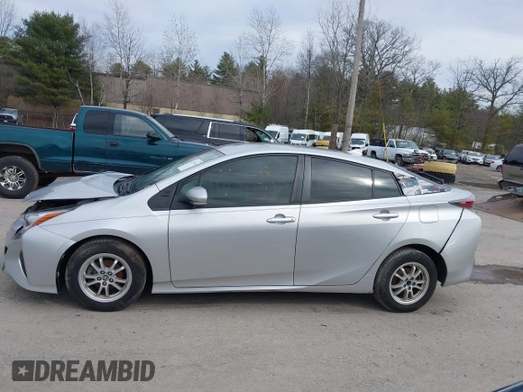 2016 Toyota Prius Two with VIN JTDKBRFUXG3023523, listed as a IAAI auction lot 41757143 with 124,144 mi miles. Bid and sale history available at carsss.com. Image 14.