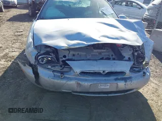 1996 Mercury Sable GS with VIN 1MELM50U5TA633365, listed as a IAAI auction lot 41723519 with 144,067 mi miles. Bid and sale history available at carsss.com. Image 6.