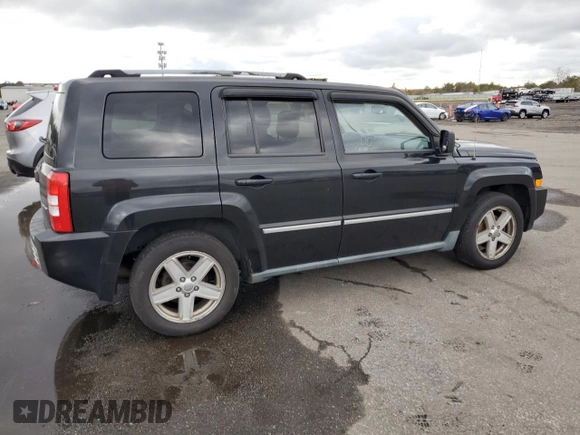 2010 Jeep Patriot Limited with VIN 1J4NF4GB0AD511652, listed as a Copart auction lot 82161234 with 173,164 mi miles and Clean Title. Bid and sale history available at carsss.com. Image 3.