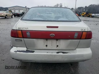 1996 Nissan Sentra XE z VIN 1N4AB41D2TC767557, wystawiony jako Copart lot #42553245 z przebiegiem 148 514 mil mil oraz Szkoda całkowita • Salvage title. Historia ofert i sprzedaży dostępna na DreamBid. Obrazek 6.