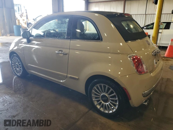 2012 FIAT 500 Lounge with VIN 3C3CFFER4CT382843, listed as a Copart auction lot 63060105 with 94,660 mi miles and Salvage title. Bid and sale history available at DreamBid. Image 2.