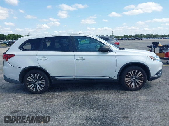 2020 Mitsubishi Outlander ES z VIN JA4AD2A30LZ034060, wystawiony jako IAAI lot #42207169 z przebiegiem 91 049 mil mil oraz . Historia ofert i sprzedaży dostępna na DreamBid. Obrazek 13.