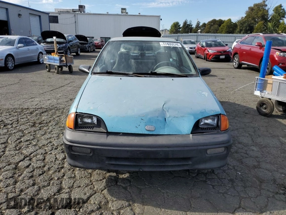 1992 Geo Metro z VIN 2C1MS2465N6782913, wystawiony jako Copart lot #77405574 z przebiegiem 77 080 mil mil oraz Szkody całkowita. Historia ofert i sprzedaży dostępna na DreamBid. Obrazek 5.