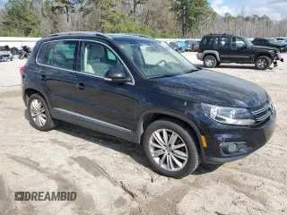 2012 Volkswagen Tiguan SE with VIN WVGAV7AX1CW610349, listed as a Copart auction lot 49250985 with 139,718 mi miles and Salvage Title. Bid and sale history available at DreamBid. Image 4.