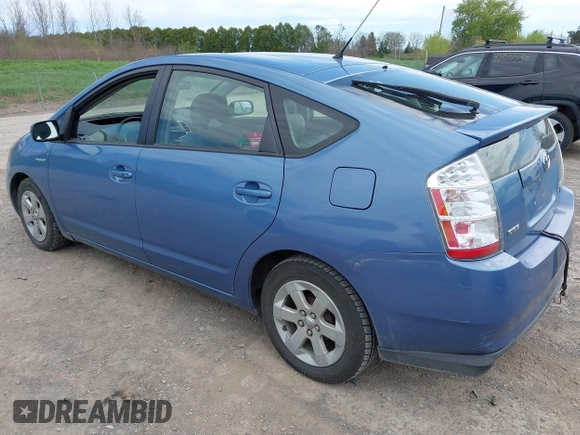 2007 Toyota Prius with VIN JTDKB20U677586433, listed as a IAAI auction lot 42163815 with 105,343 mi miles and . Bid and sale history available at DreamBid. Image 3.