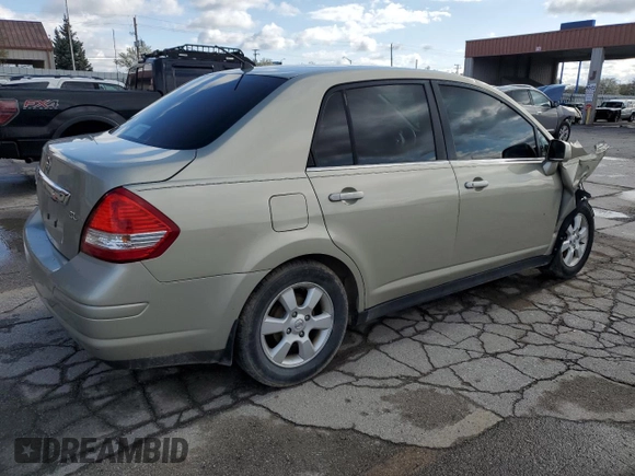 2007 Nissan Versa SL with VIN 3N1BC11E57L445561, listed as a Copart auction lot 53709695 with 143,925 mi miles and Salvage title. Bid and sale history available at DreamBid. Image 3.