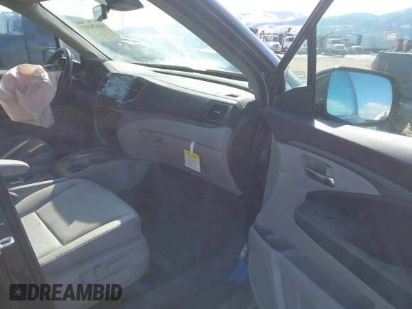 2022 Honda Ridgeline RTL-E with VIN 5FPYK3F71NB013522, listed as a IAAI auction lot 41670347 with 24,689 mi miles and . Bid and sale history available at DreamBid. Image 5.
