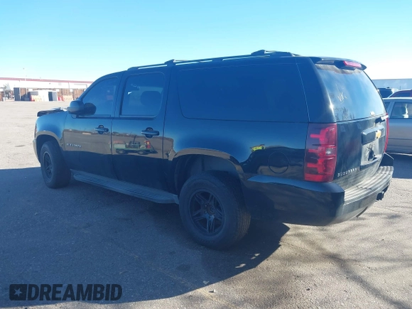 2013 Chevrolet Suburban LS with VIN 1GNSKHE76DR155667, listed as a IAAI auction lot 41053774 with 118,655 mi miles. Bid and sale history available at carsss.com. Image 3.