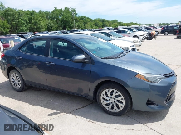 2018 Toyota Corolla L z VIN 5YFBURHE4JP820560, wystawiony jako IAAI lot #42317624 z przebiegiem 84 946 mil mil oraz . Historia ofert i sprzedaży dostępna na DreamBid. Obrazek 13.