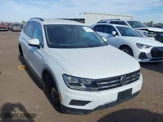 2020 Volkswagen Tiguan SE with VIN 3VV3B7AX0LM039721, listed as a IAAI auction lot 41627081 with 56,405 mi miles. Bid and sale history available at carsss.com. Image 1.