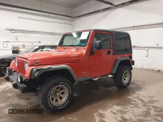 2006 Jeep Wrangler Sport with VIN 1J4FA49S06P729497, listed as a IAAI auction lot 41906227 with 134,573 mi miles. Bid and sale history available at carsss.com. Image 14.