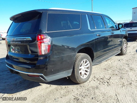 2021 Chevrolet Suburban LT with VIN 1GNSCCKD0MR195186, listed as a IAAI auction lot 41621859 with 129,691 mi miles. Bid and sale history available at carsss.com. Image 4.