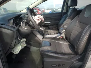2014 Ford Escape SE with VIN 1FMCU9G97EUE10882, listed as a Copart auction lot 58770725 with 128,167 mi miles and Clean title. Bid and sale history available at DreamBid. Image 7.