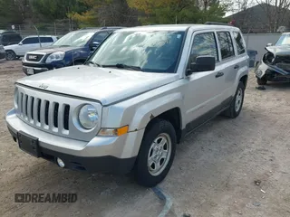 2013 Jeep Patriot Sport with VIN 1C4NJPBAXDD254864, listed as a IAAI auction lot 42019511 with 139,994 mi miles. Bid and sale history available at carsss.com. Image 2.