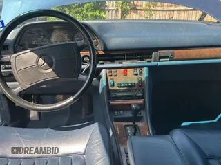 1988 Mercedes-Benz 560 with VIN WDBCA39D0JA421504, listed as a Copart auction lot 52342525 with 82,277 mi miles and Clean Title. Bid and sale history available at DreamBid. Image 9.
