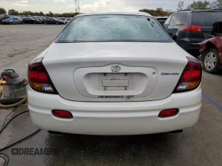 2003 Oldsmobile Aurora z VIN 1G3GS64C834100084, wystawiony jako Copart lot #76966704 z przebiegiem 70 263 mil mil oraz Szkody całkowita. Historia ofert i sprzedaży dostępna na DreamBid. Obrazek 6.