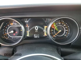 2019 Jeep Wrangler Unlimited Sahara with VIN 1C4HJXEN4KW507772, listed as a Copart auction lot 52104825 with 74,527 mi miles and Clean title. Bid and sale history available at DreamBid. Image 9.