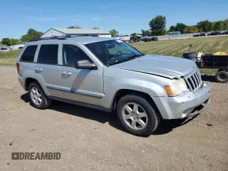 2009 Jeep Grand Cherokee Laredo with VIN 1J8HR48P29C537653, listed as a Copart auction lot 70190404 with 192,796 mi miles and Salvage Title. Bid and sale history available at carsss.com. Image 4.
