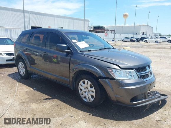 2015 Dodge Journey American Value z VIN 3C4PDCAB2FT637391, wystawiony jako IAAI lot #42354094 z przebiegiem 130 743 mil mil oraz . Historia ofert i sprzedaży dostępna na DreamBid. Obrazek 1.