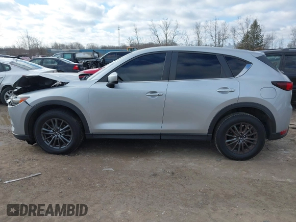 2020 Mazda CX-5 Touring with VIN JM3KFACM5L0768371, listed as a IAAI auction lot 41862623 with 138,446 mi miles and . Bid and sale history available at carsss.com. Image 14.