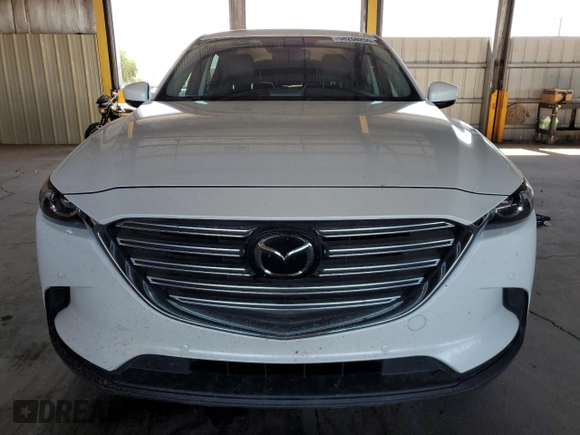 2020 Mazda CX-9 Touring with VIN JM3TCBCY1L0414112, listed as a Copart auction lot 58260255 with 66,773 mi miles and Salvage title. Bid and sale history available at DreamBid. Image 5.