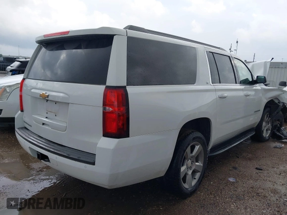 2020 Chevrolet Suburban LT z VIN 1GNSCHKC9LR284936, wystawiony jako IAAI lot #41196246 z przebiegiem Nie podano mil oraz . Historia ofert i sprzedaży dostępna na DreamBid. Obrazek 4.