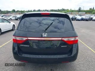 2012 Honda Odyssey Touring with VIN 5FNRL5H93CB121190, listed as a IAAI auction lot 42223998 with 154,358 mi miles and . Bid and sale history available at DreamBid. Image 16.