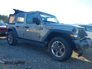 2018 Jeep Wrangler Unlimited Sport S z VIN 1C4HJXDG0JW158935, wystawiony jako IAAI lot #41187384 z przebiegiem 69 721 mil mil oraz . Historia ofert i sprzedaży dostępna na DreamBid. Obrazek 13.