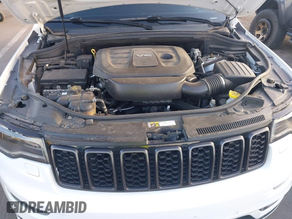 2018 Jeep Grand Cherokee Overland z VIN 1C4RJFCG7JC158464, wystawiony jako IAAI lot #42056386 z przebiegiem 94 608 mil mil oraz . Historia ofert i sprzedaży dostępna na DreamBid. Obrazek 10.