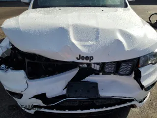 2022 Jeep Grand Cherokee WK Laredo E with VIN 1C4RJFAG7NC141592, listed as a Copart auction lot 79126804 with 55,062 mi miles and Salvage Title. Bid and sale history available at carsss.com. Image 12.