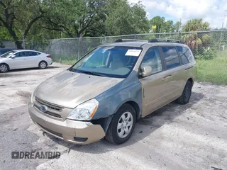 2006 Kia Sedona LX with VIN KNDMB233766055029, listed as a IAAI auction lot 39969975 with 189,090 mi miles. Bid and sale history available at carsss.com. Image 2.