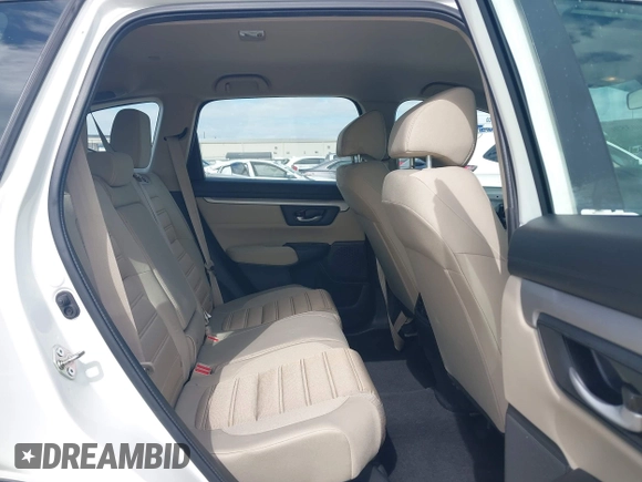 2018 Honda CR-V LX with VIN 2HKRW5H30JH414854, listed as a IAAI auction lot 42003596 with 26,322 mi miles and . Bid and sale history available at DreamBid. Image 8.