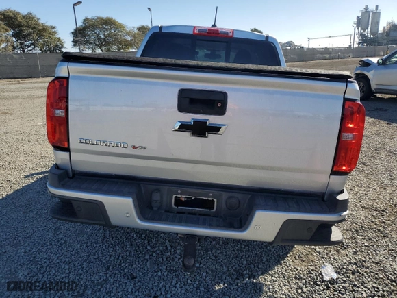 2019 Chevrolet Colorado 4WD Z71 with VIN 1GCGTDENXK1232118, listed as a Copart auction lot 87080994 with 50,306 mi miles and Salvage Title. Bid and sale history available at carsss.com. Image 6.