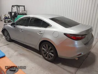 2018 Mazda 6 Touring with VIN JM1GL1VM8J1312778, listed as a IAAI auction lot 41387098 with 129,611 mi miles and . Bid and sale history available at carsss.com. Image 3.