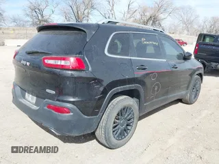 2015 Jeep Cherokee North with VIN 1C4PJMCS7FW544792, listed as a IAAI auction lot 41801573 with 140,575 mi miles. Bid and sale history available at carsss.com. Image 4.