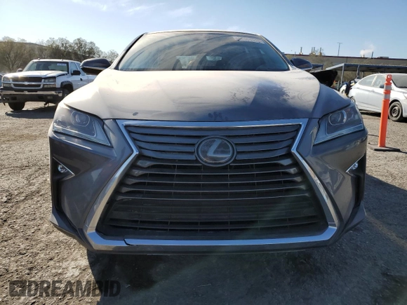 2019 Lexus RX with VIN 2T2ZZMCAXKC138738, listed as a Copart auction lot 42604515 with 60,604 mi miles and Salvage Title. Bid and sale history available at carsss.com. Image 5.