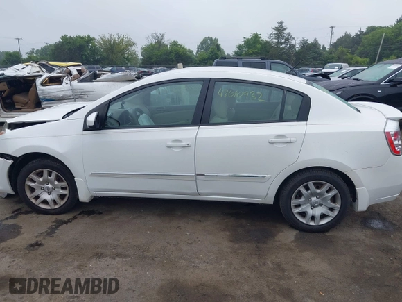 2012 Nissan Sentra S z VIN 3N1AB6APXCL636612, wystawiony jako IAAI lot #42610932 z przebiegiem 150 605 mil mil oraz . Historia ofert i sprzedaży dostępna na DreamBid. Obrazek 14.