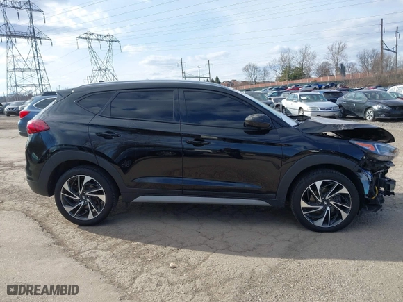 2021 Hyundai Tucson Sport with VIN KM8J3CAL6MU411855, listed as a IAAI auction lot 41694634 with 67,779 mi miles. Bid and sale history available at carsss.com. Image 14.