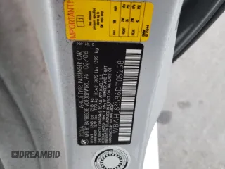 2006 BMW 7 Series 750i with VIN WBAHL83586DT05258, listed as a Copart auction lot 77033744 with 129,376 mi miles and Salvage Title. Bid and sale history available at carsss.com. Image 12.